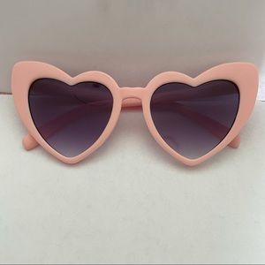 Pink heart shaped sunglasses